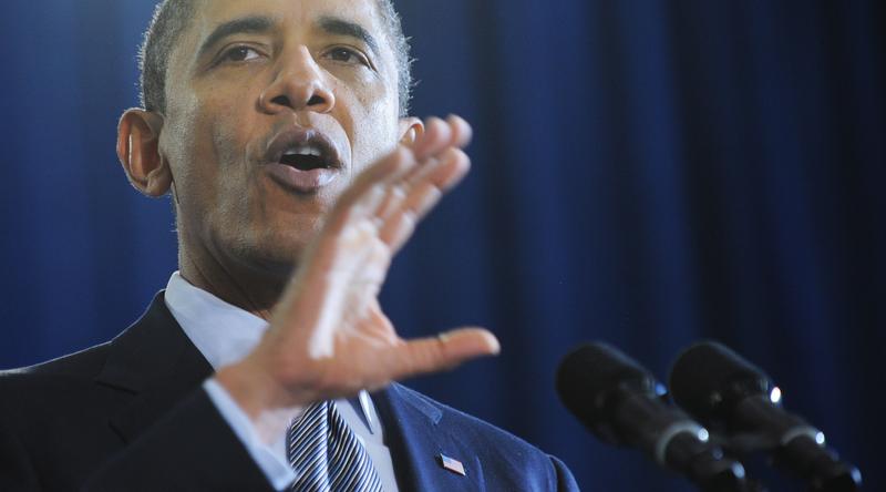 President Barack Obama speaks on the economy and an extension of the payroll tax cut at Osawatomie High School December 6, 2011 in Osawatomie, Kansas.